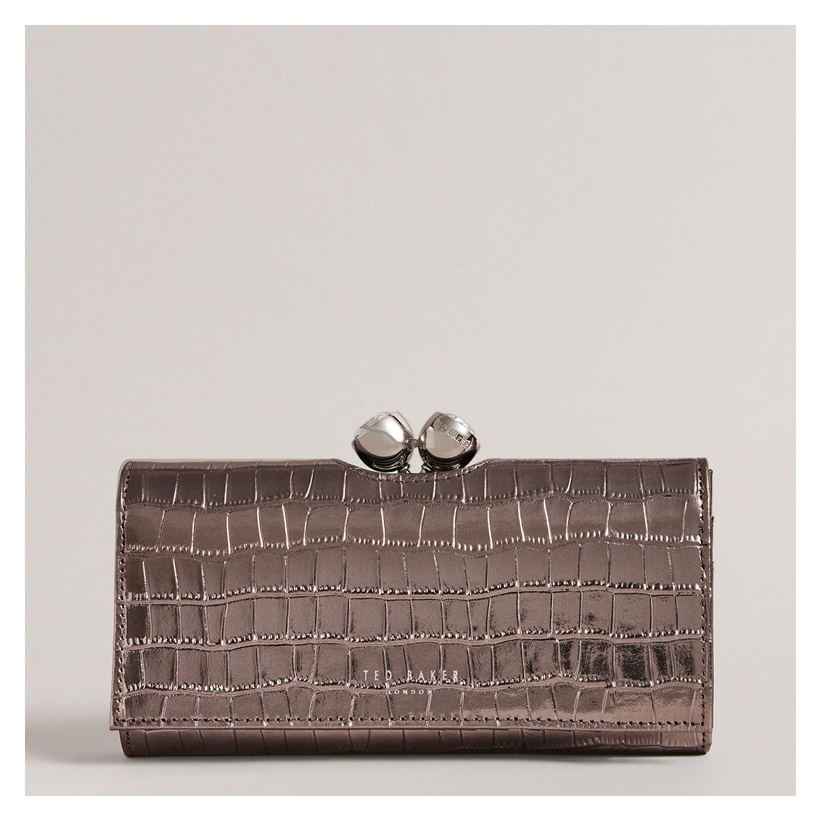 Porte-monnaie en forme de boule Rosyela en bronze main product photo